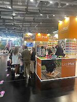 Visitors at the LickiMat stand at Interzoo 2024